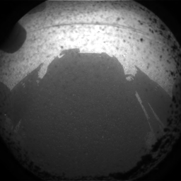 One of the first Curiosity images, shadow on the martian floor, a few minutes after touchdown. Credits: NASA/JPL-Clatech.